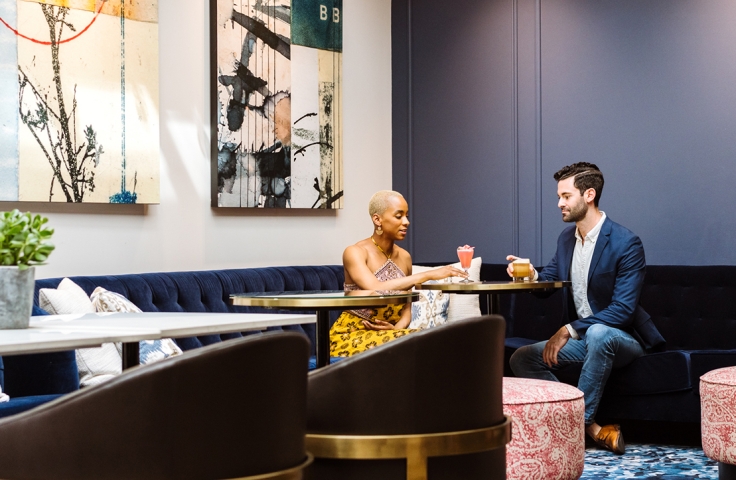 Couple in a Lobby with drinks