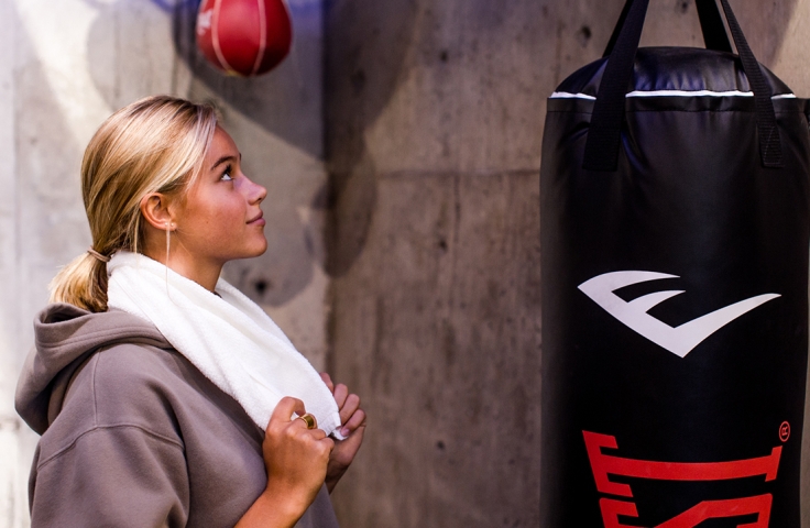 Woman and the Punching bag